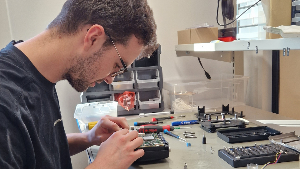 Mikael working on hardware