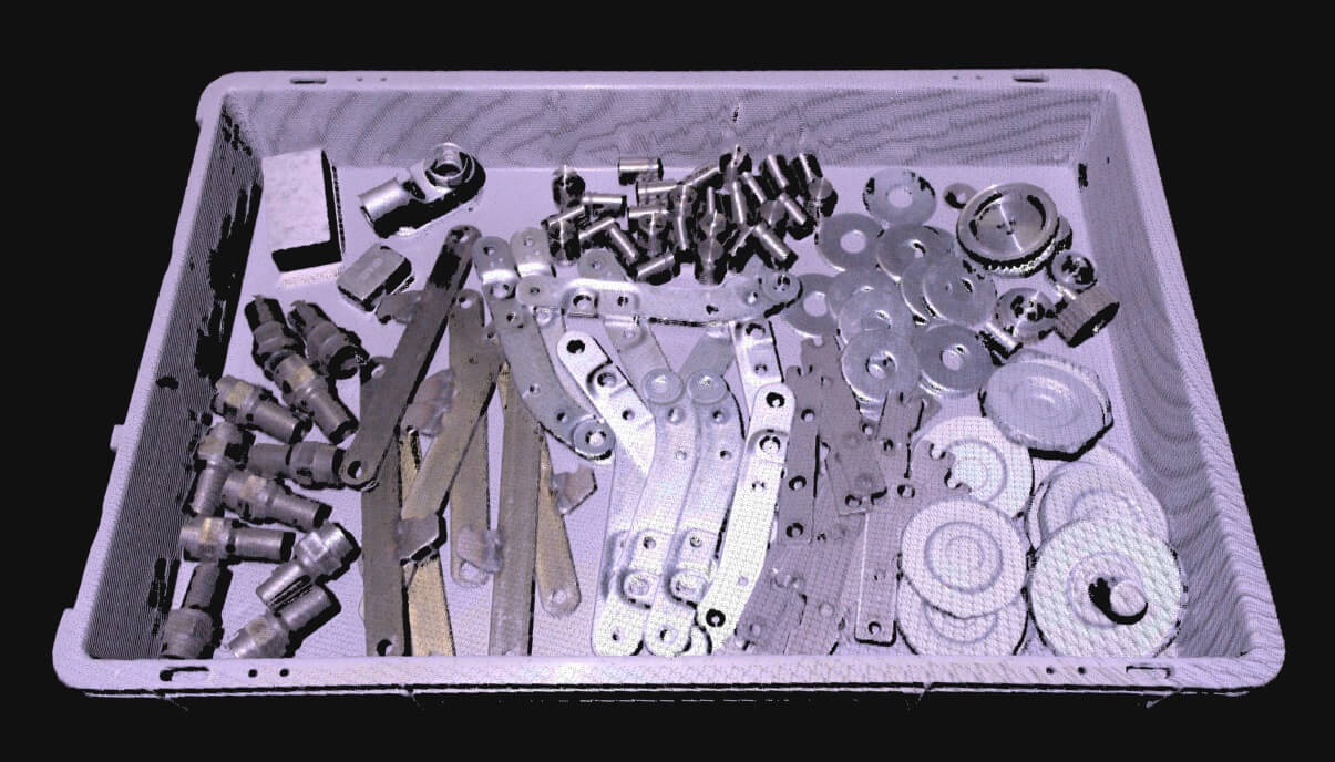 Image shows metal parts and cylinders in a bin captured by Zivid for picking applications